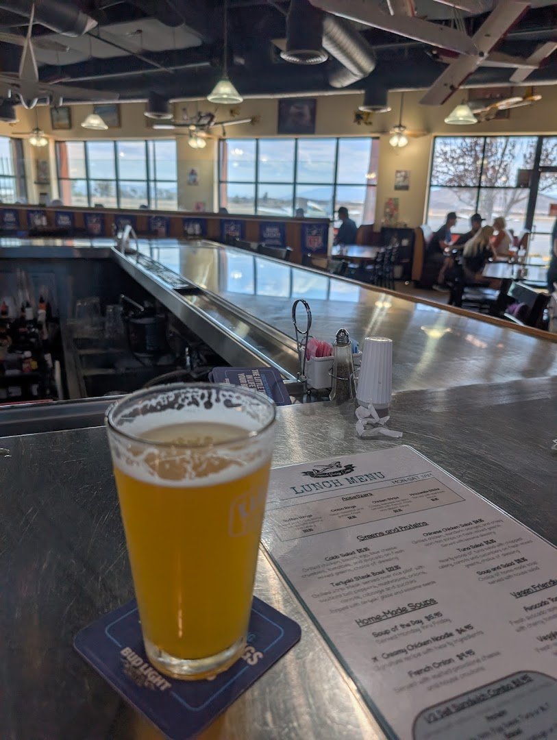 Casual cafe seating with runway views.