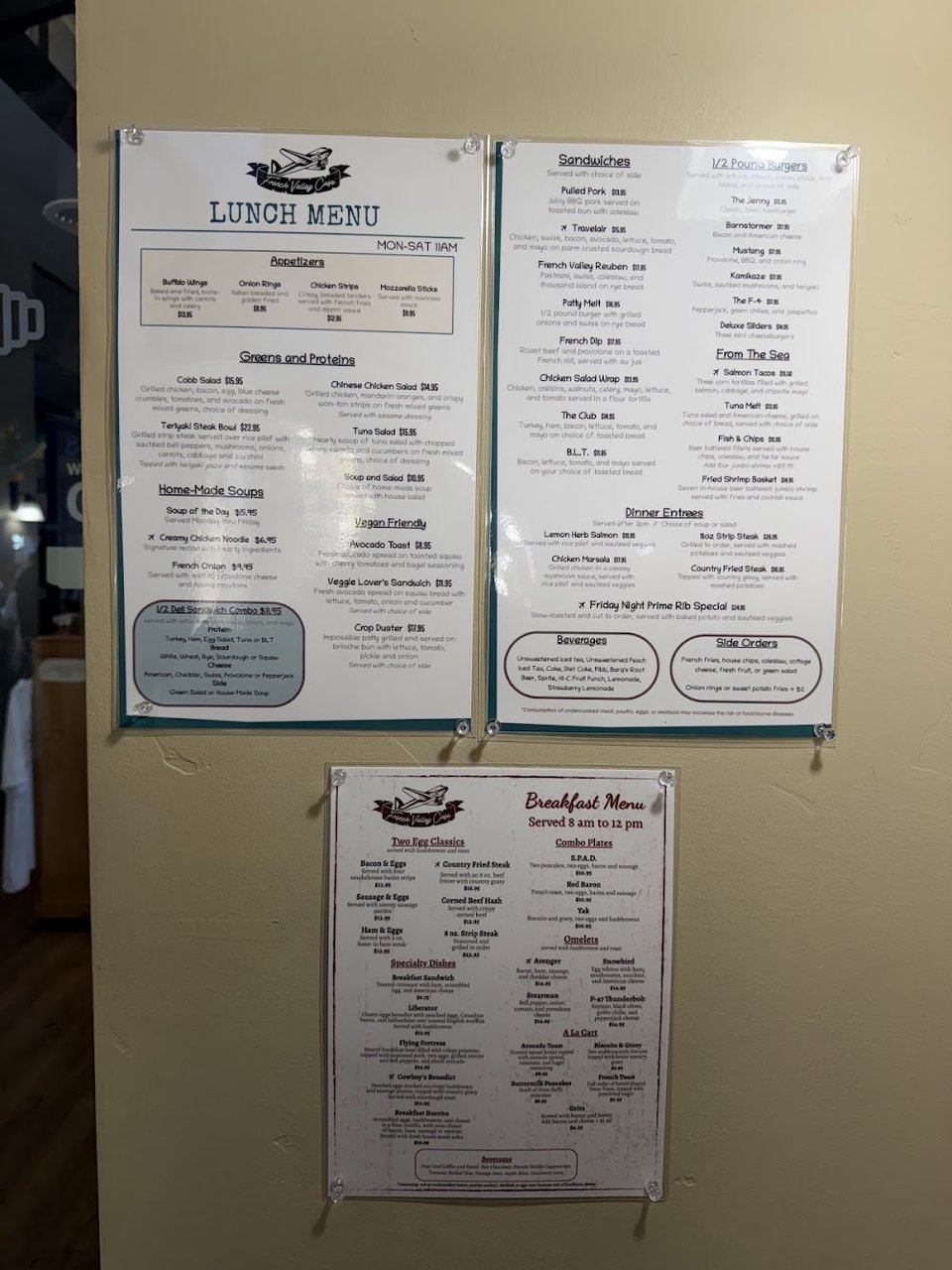 Printed menu with breakfast plates and side dishes.